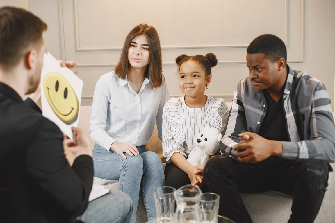 Photo of a Family Doing a Therapy Session